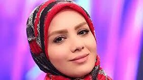 ویدیو/ حضور مجری زن صداوسیما با اسلحه کلاشینکف روی آنتن زنده
