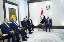 دیدار همتی با نخست وزیر عراق در بغداد